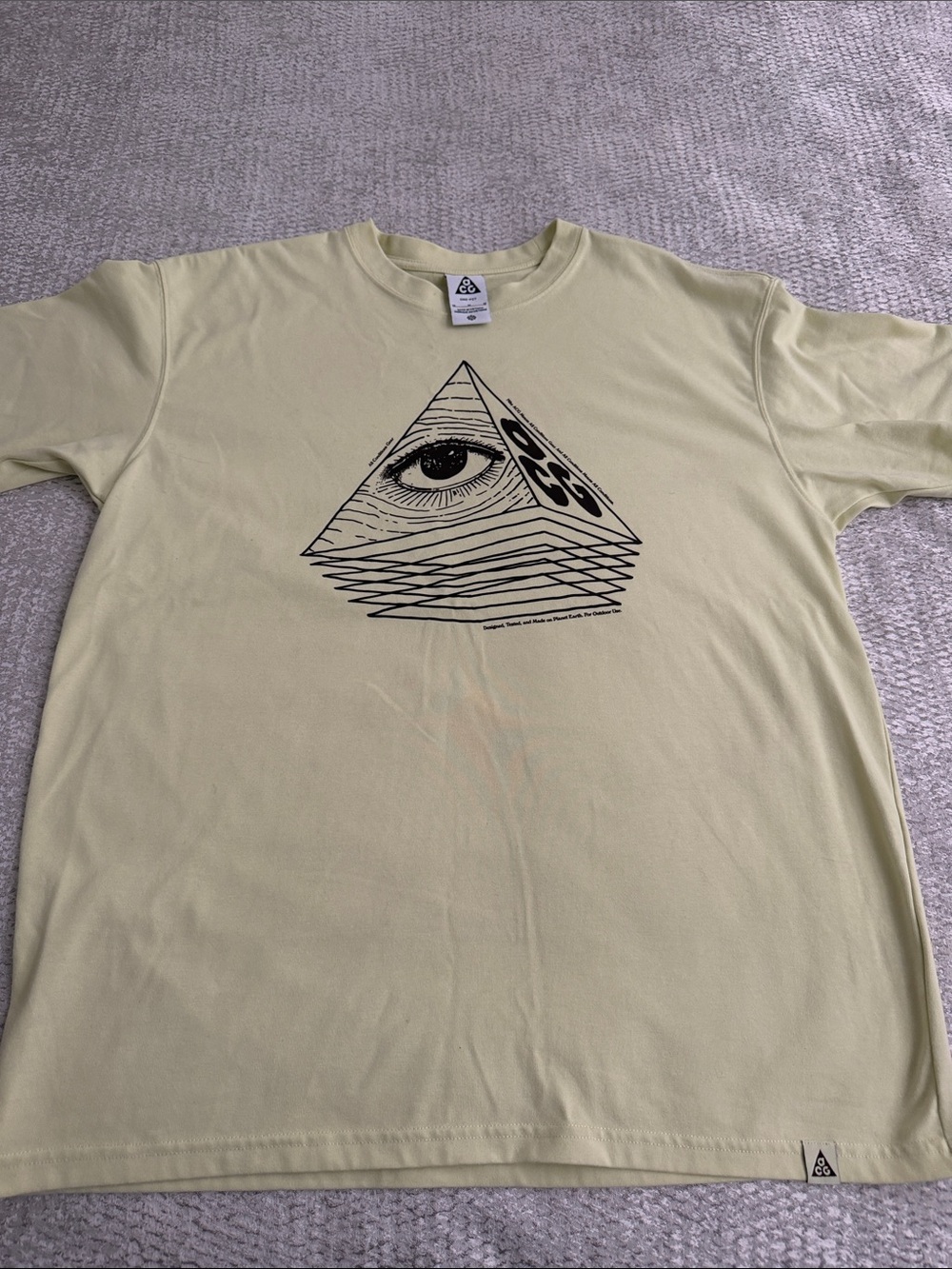 Nike ACG Pale Yellow Pyramid Eye Graphic Tee